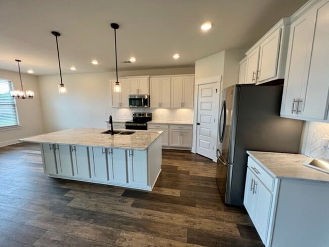 Building Photo - Beautiful 4 Bed/ 3.5 Bath Home in Newly Built Rivers Edge!