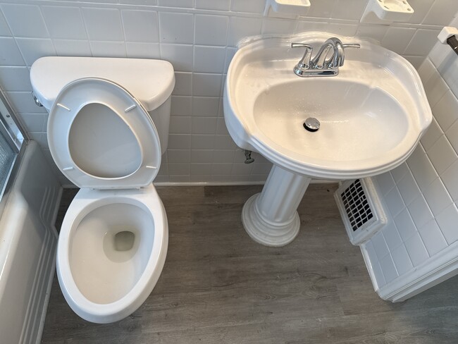 Building Photo - 7441 Calvin Ave