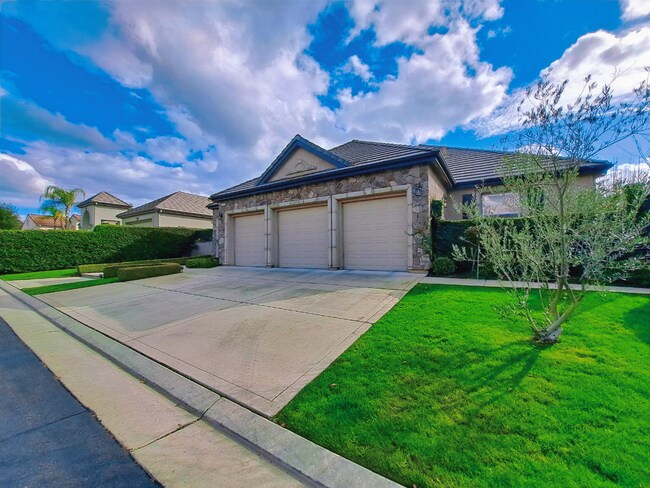 Building Photo - PRICE REDUCED TO $3795 – Custom Clovis Residence in Gated Community | Spacious Layout & 3-Car Gar...