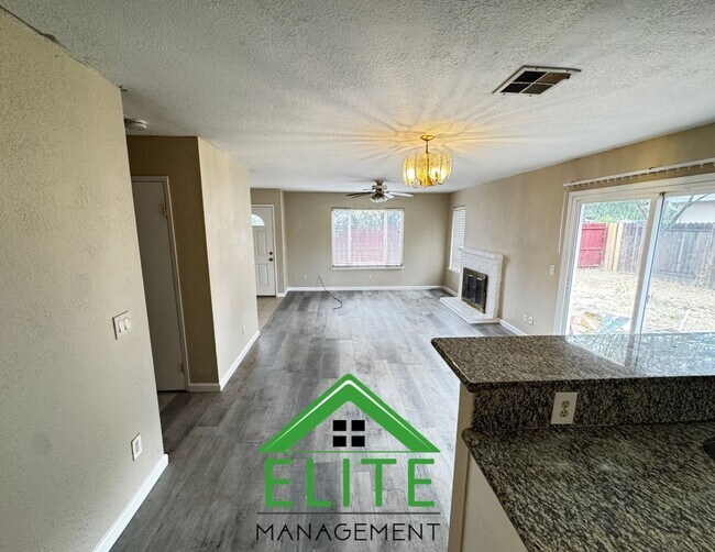 Building Photo - **Spacious 3-Bedroom Condo with 2-Car Gara...