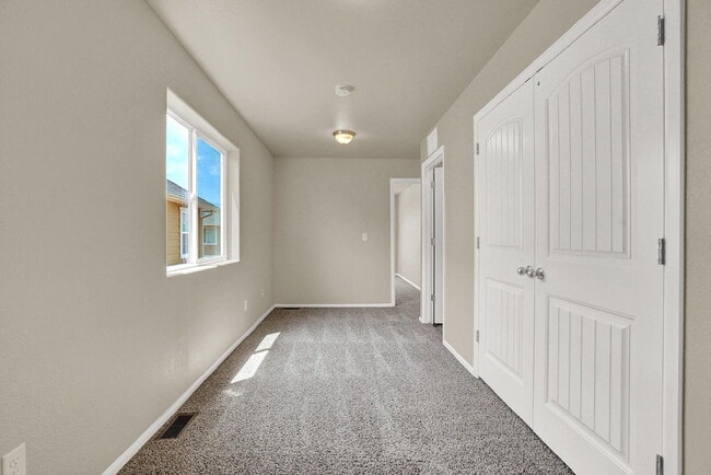 Building Photo - Modern Townhome with Central A/C, 2-Car Ga...