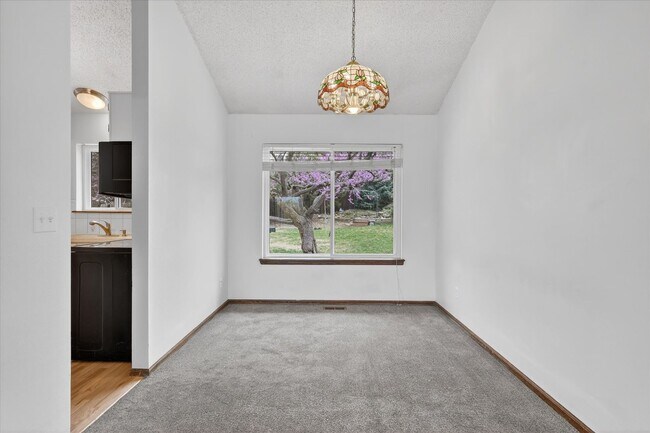 Building Photo - 4BR/4BA Updated Home with Finished Basement Suite & Landscaped Yard