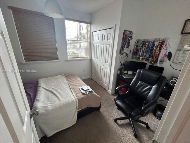 Building Photo - 5590 NW 107th Ave