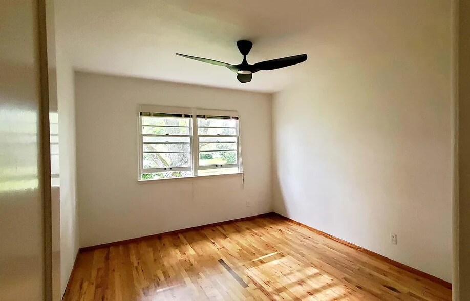 Larger bedroom with view to courtyard - 6821 NE Broadway