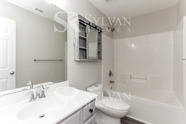 Building Photo - Enjoy living the good life in this 4 bedro...