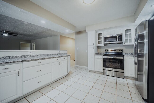 Building Photo - SHORT TERM - Spacious 3-Bedroom home with Wrap-Around Porch