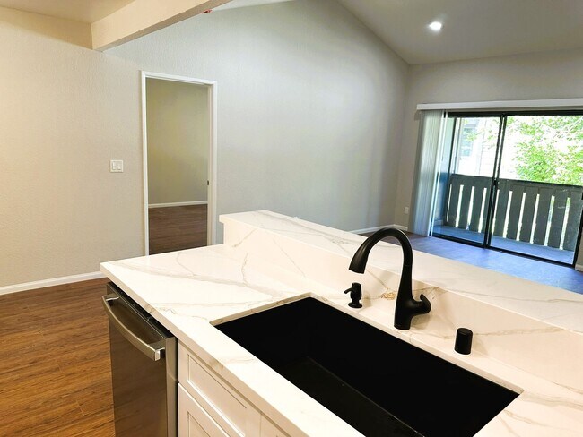 Building Photo - Fully Remodeled Second Story Condo with La...