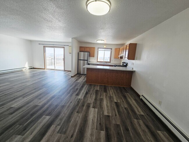 Building Photo - Fully Remodeled 1,250 Sq Ft 2 Bedroom Apartment with Garage, In-Unit Laundry & Private Balcony – ...