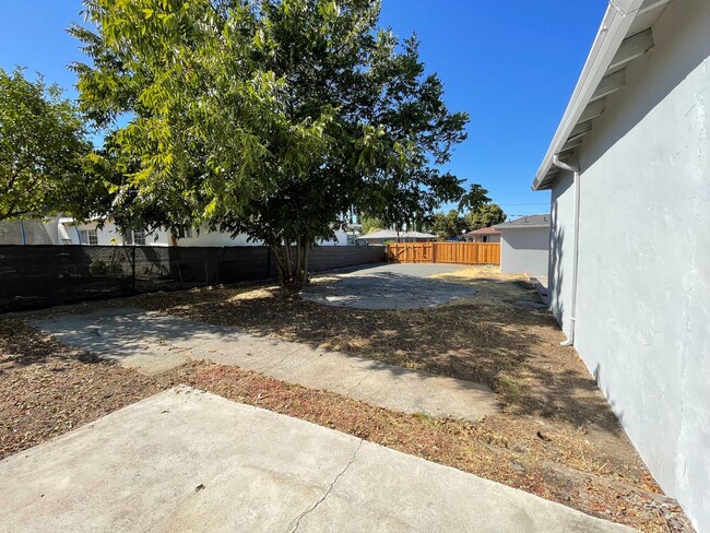 Building Photo - Huge yard with 4 car garage! Newly Remodel...