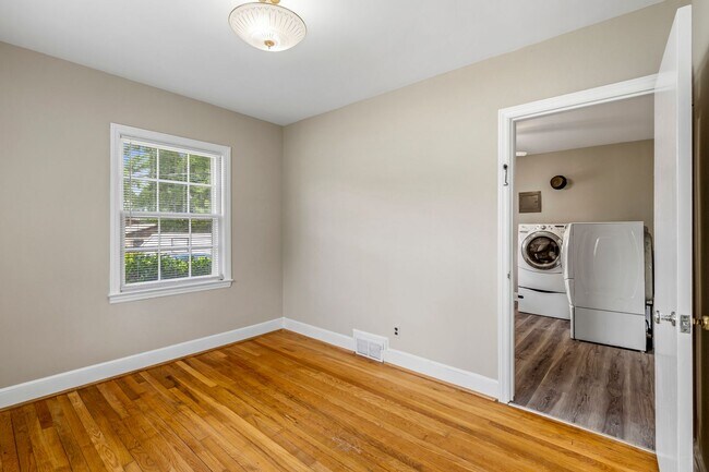 Building Photo - Large Renovated Ranch Home, Two Kitchens & Two Living Areas, Hardwood Flooring, Deck, Fenced!