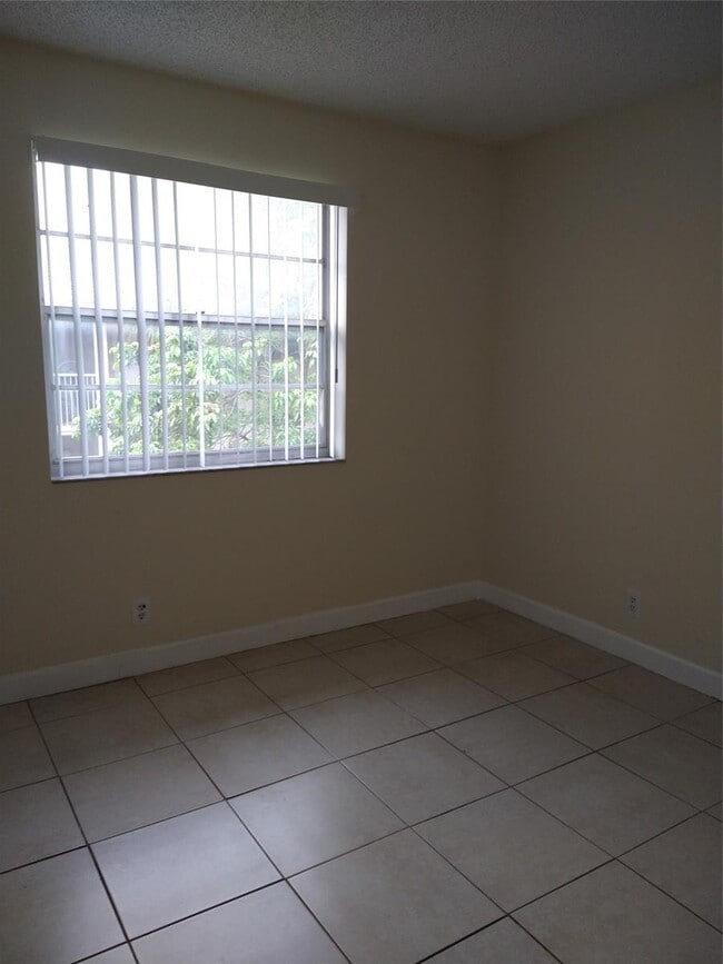 Building Photo - 8395 Royal Palm Blvd