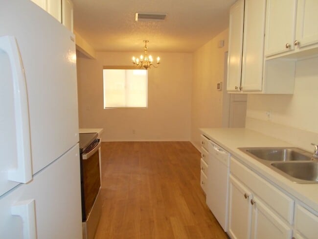 Building Photo - 4-Bedroom Home with Spacious Backyard