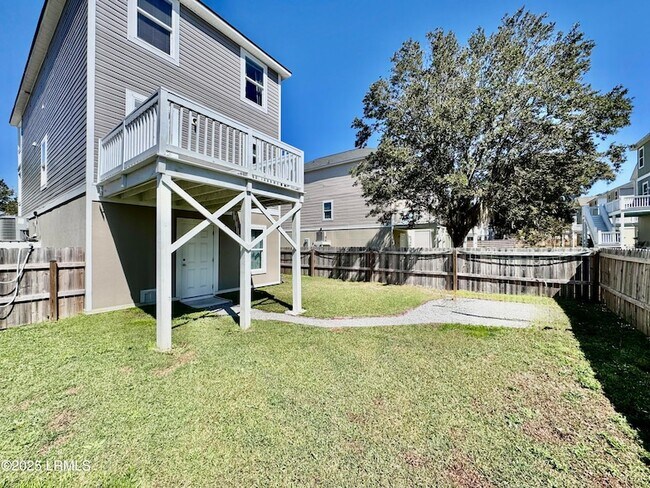 Building Photo - 23 Island Breeze Ln