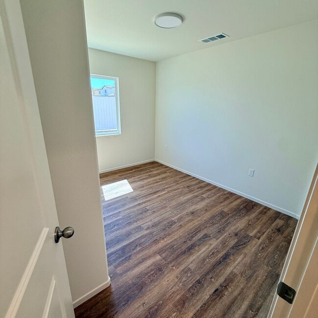 Building Photo - BRAND NEW 4 BEDROOM ADELANTO HOME / 1/2 OFF FIRST MONTH'S RENT