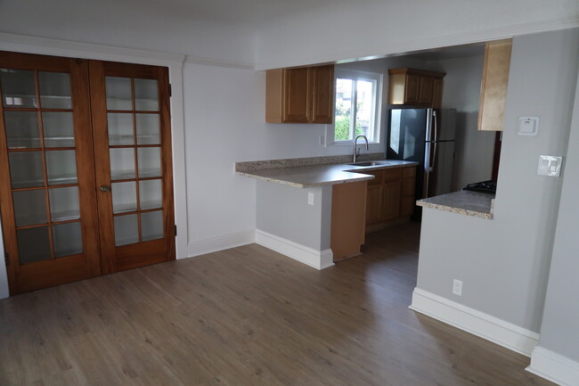 Eat-in kitchen is open to living room - 2058 Buena Vista Ave