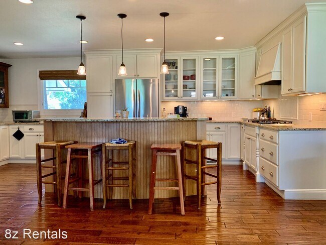 Building Photo - 4 br, 3 bath House - 6942 Roaring Fork Trail