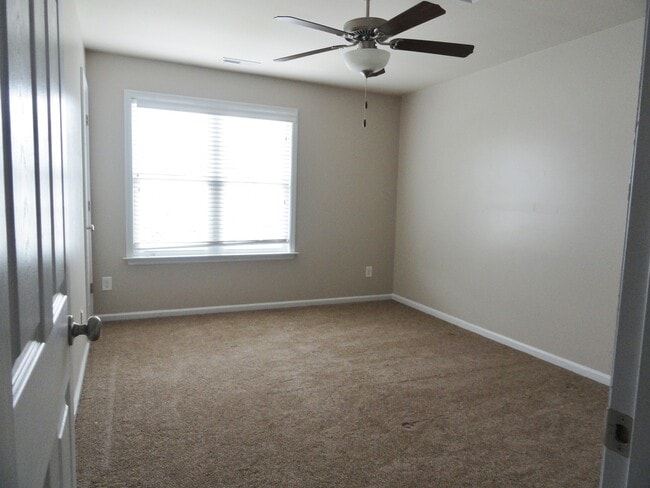 Building Photo - End Unit with Lots of Upgrades!