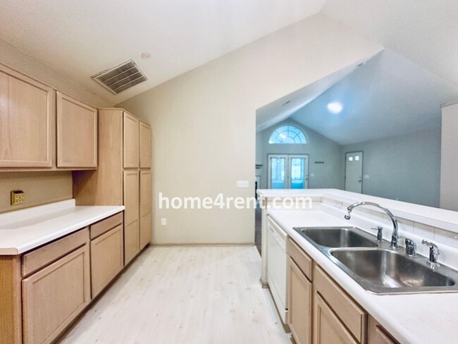 Building Photo - Maintenance FREE, Ranch Style Townhome w/ ...