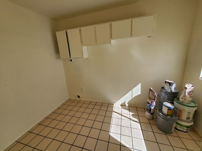 Building Photo - 4 bedrooms and 2 bathrooms with A/C.