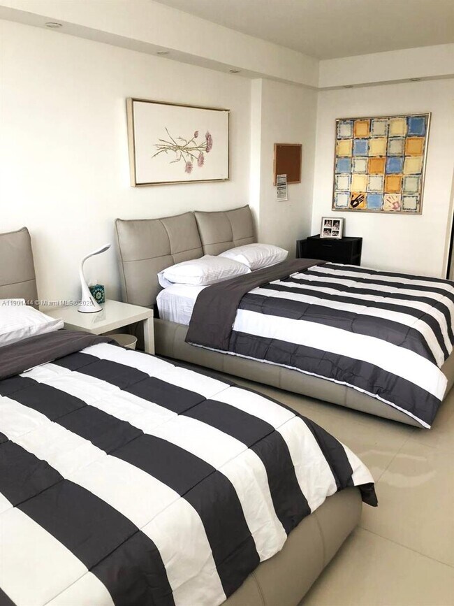 Building Photo - 19390 Collins Ave