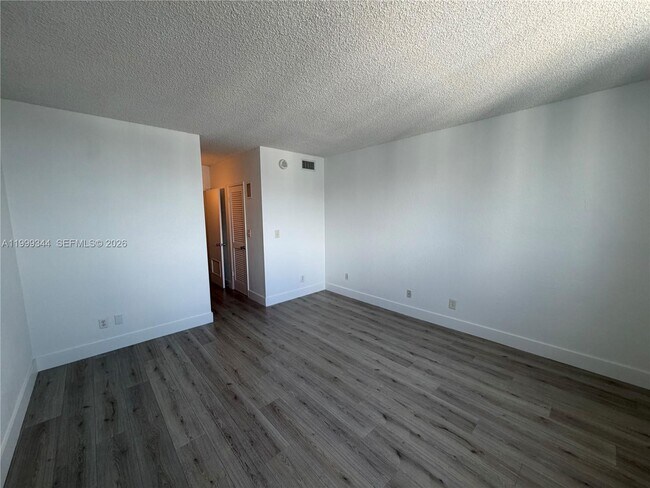 Building Photo - 19380 Collins Ave