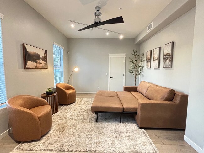 Building Photo - Welcome Home! Fully Furnished with Month to Month leasing options available. Contact us today to ...