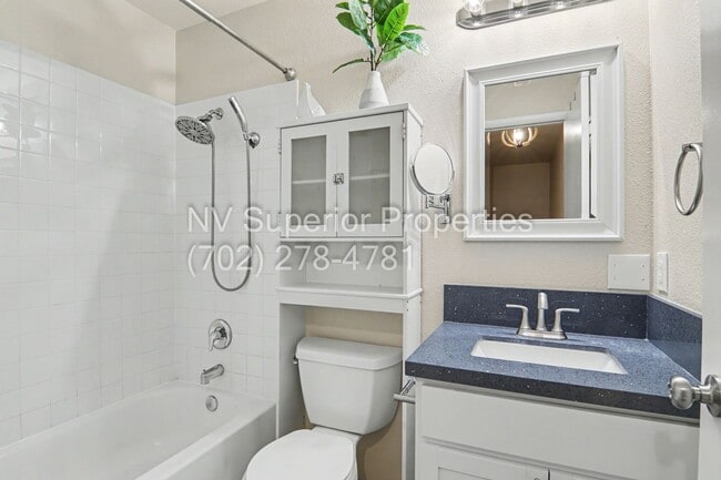 Building Photo - SE!! Close to UNLV!! 2 Bedroom 2 story!! 1 Car Carport!! Fully Furnished!! Community Pool!! and T...