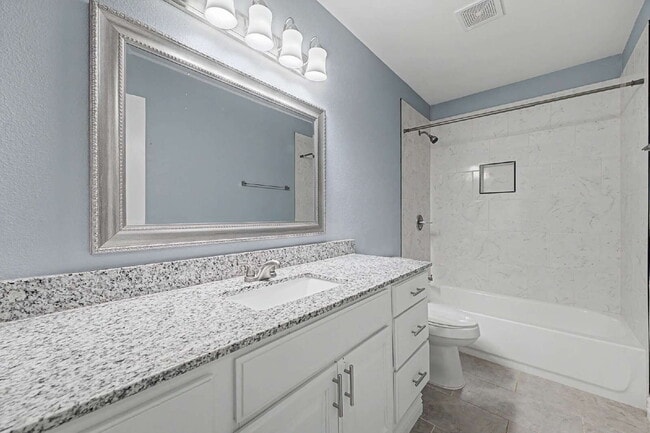 Building Photo - $200 MOVE IN SPECIAL |4-Bed Oasis with Granite Touches & Cozy Fireplace at 1501 South Brecke