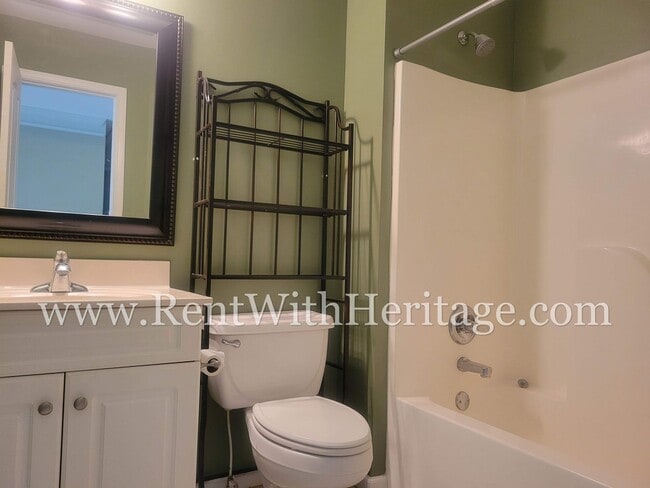 Building Photo - Gorgeous 3-Story Brick Home / 2 Fireplaces / Full Finished Basement / Chapel Hill Schools