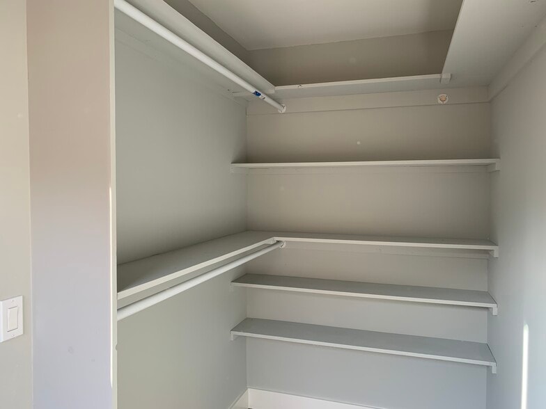 Walk-in spacious closet with plenty of room for big and small luggage - 463 Rosewood Ave