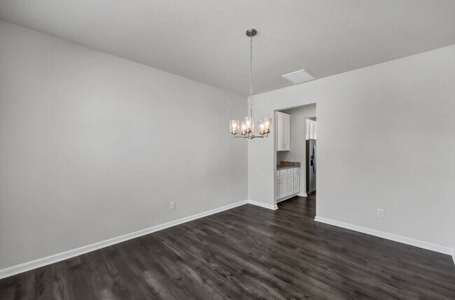 Building Photo - Sophisticated Like-New 4-Bedroom Home with Designer Finishes & Fenced Backyard!
