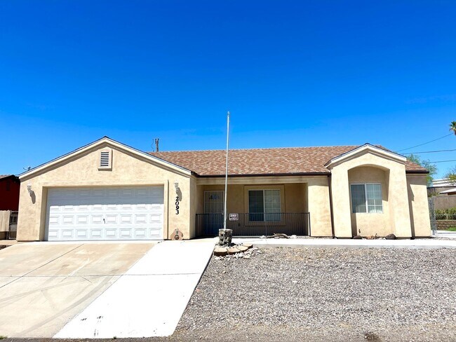 Building Photo - Inviting 3 Bedroom Home with RV Parking an...
