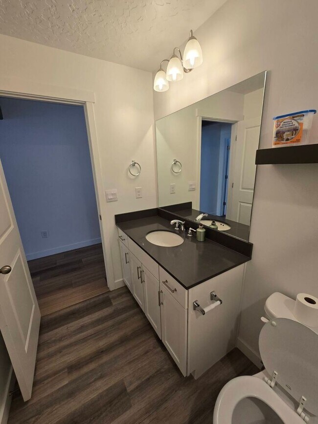 Building Photo - Nearly New, Well Appointed Modern Townhouse w 2 car attached garage