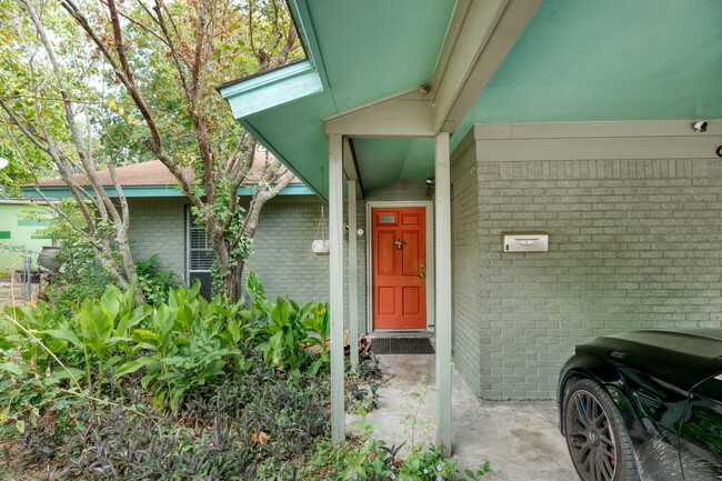 Front door with view of covered parking space - 1602 Valleyridge Dr