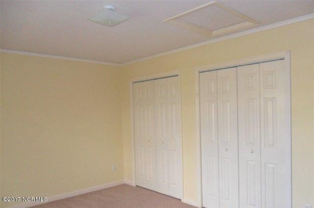 Building Photo - "Cozy Coastal Living: Charming 2-Bed, 2-Ba...
