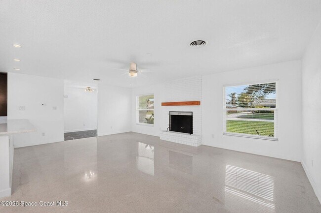 Building Photo - Welcome to this beautifully remodeled 4-bedroom, 3-bath home in the heart of Indialantic Beach!