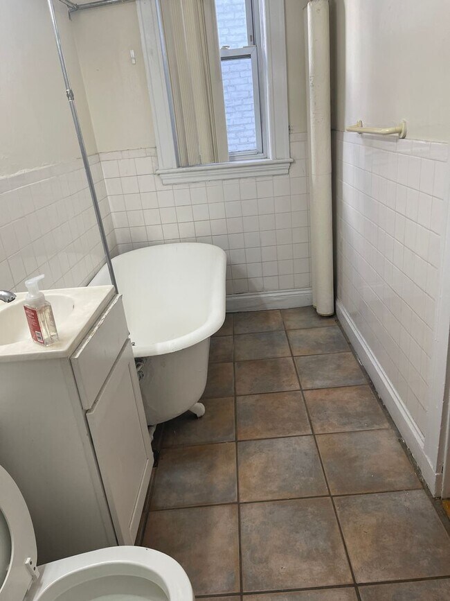 Building Photo - Allston 4 Bed split or formal 3 bed Ht Hw Included month free HW Floors Laundry Students ok