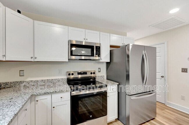 Building Photo - 6961 Raymond Ave