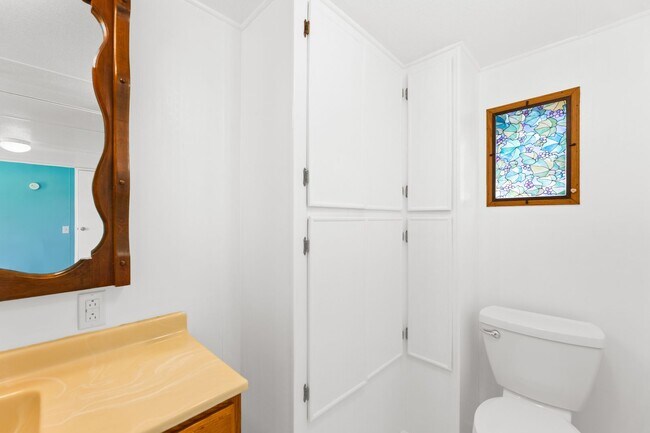 Building Photo - Updated mobile home on acre lot with garag...
