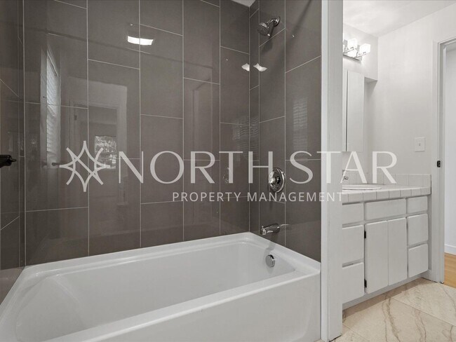 Building Photo - Charming Updated One-Level Home with Spaci...