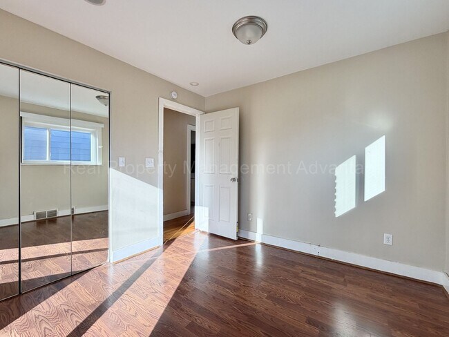 Building Photo - Solid Brick and Renovated with New Kitchen and Two Full Baths!