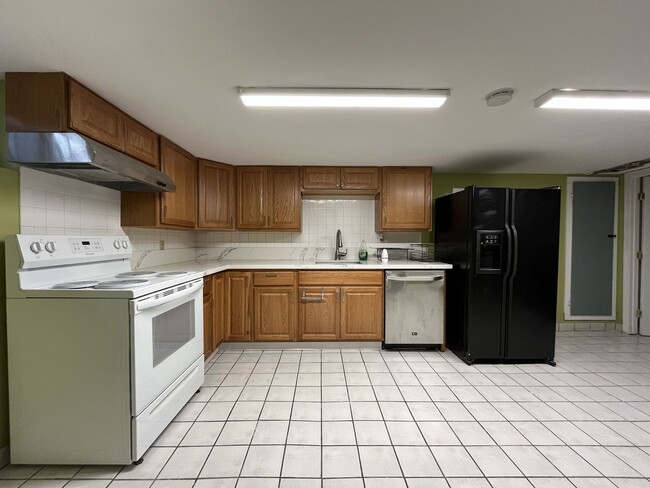 Building Photo - Classic Brick Portland Home on Stark Street with Dual Living Areas and Two Full Kitchens