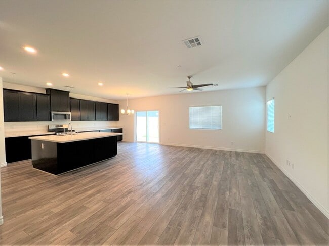 Building Photo - 4 BEDROOMS, 2.5 BATHS AT VILLIAGES AT TULE...