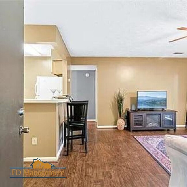 Building Photo - Modern First-Floor with Private Patio in Hampton Club