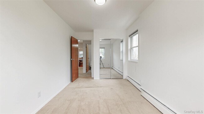 Building Photo - 56-25 Remsen Pl