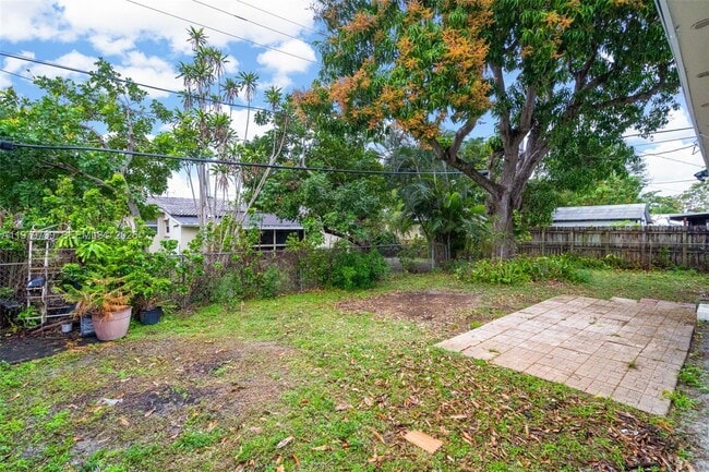 Building Photo - 5655 NE 5th Terrace