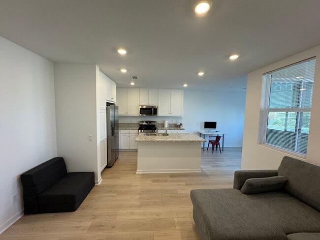 Building Photo - Brand New 1 bedroom, 1 bath Townhome with 2 car tandem garage for lease