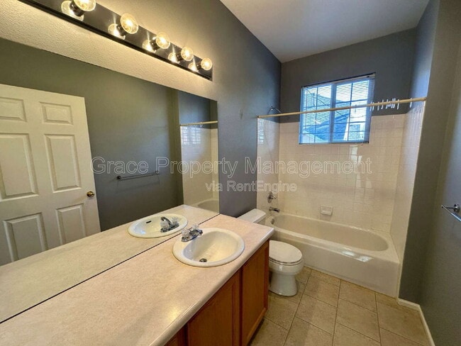 Building Photo - 9064 W Phillips Dr