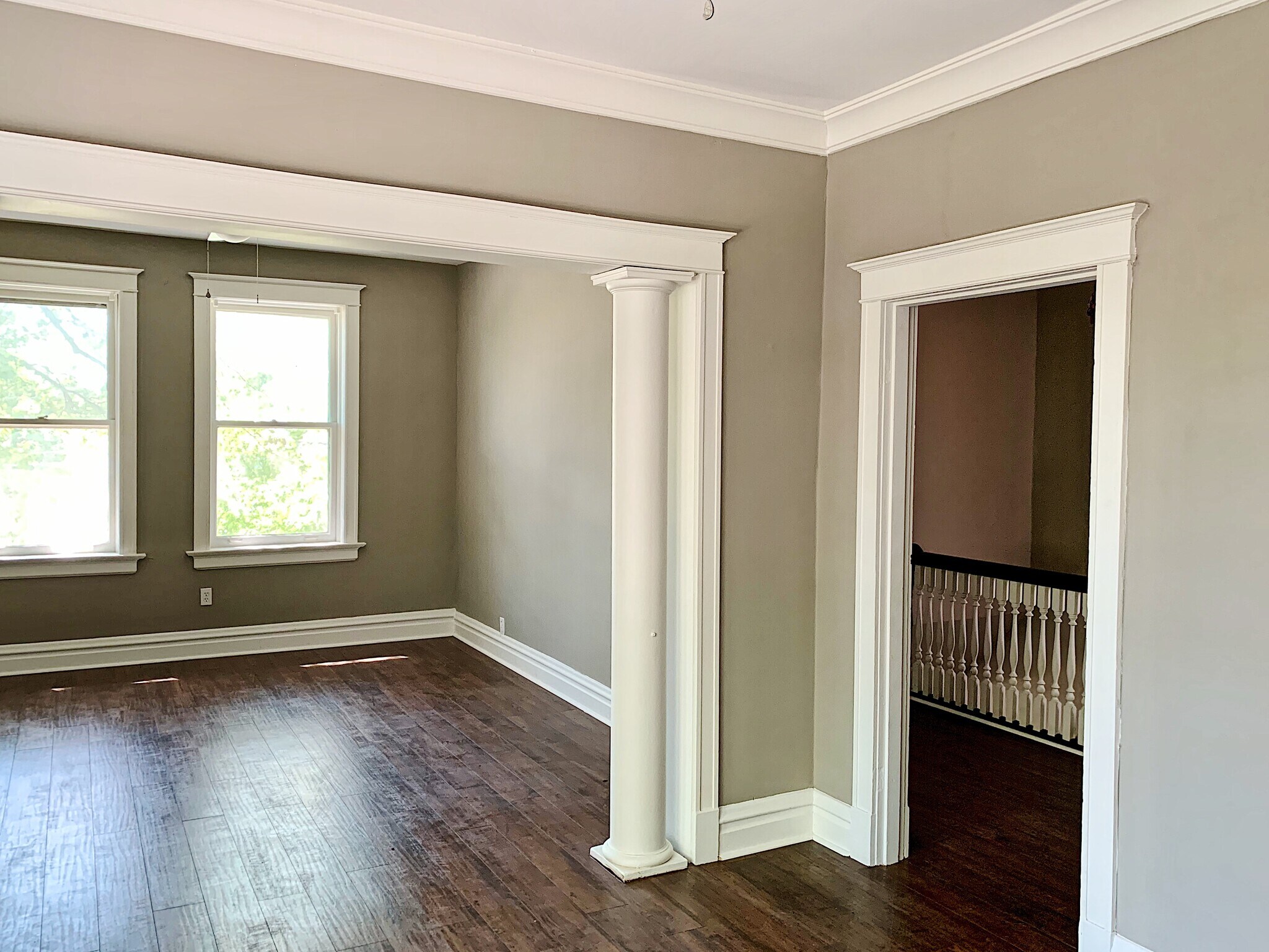 Dining room looking into living room and entry foyer - 5201 Murdoch Ave