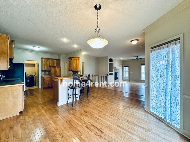 Building Photo - Maintenance Free! Main level Master, Finished Basement and Wood Floors in the Kitchen! *Brand New...